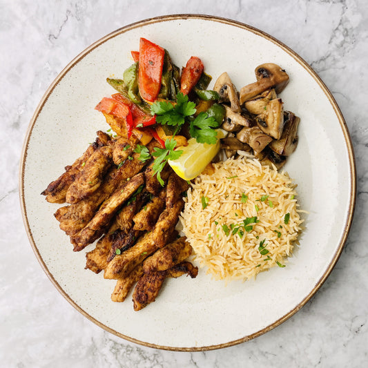 Fajita Chicken with Cajun Rice and Roasted Mushroom & Peppers